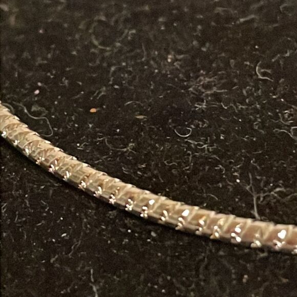 7.5” stackable polished silver tone bangle bracelet w/32 prong set crystals - Picture 6 of 12